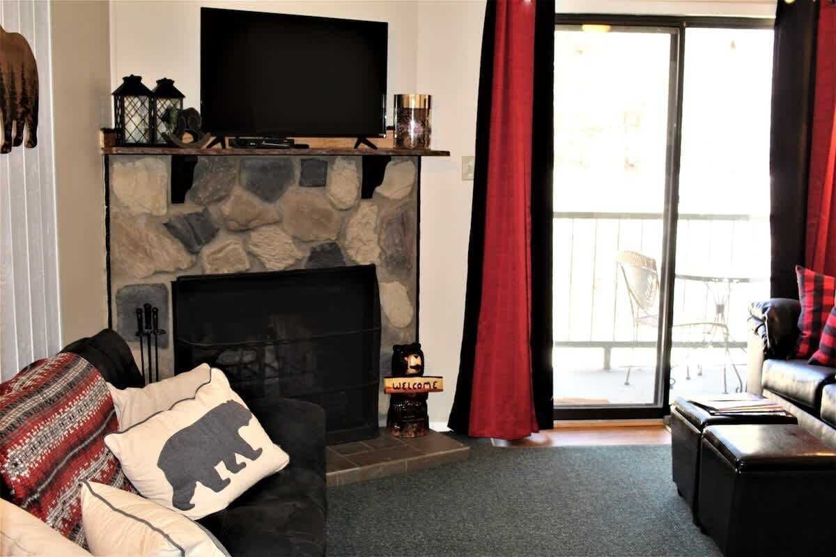 TV, fireplace, books, offices