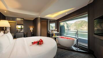 Premium bedding, down comforters, memory foam beds, minibar