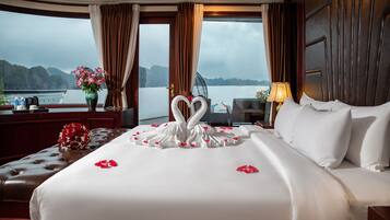 Premium bedding, down comforters, memory foam beds, minibar