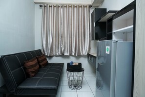 Living room - Homey 2BR Menara Cawang Apartment (Jakarta)