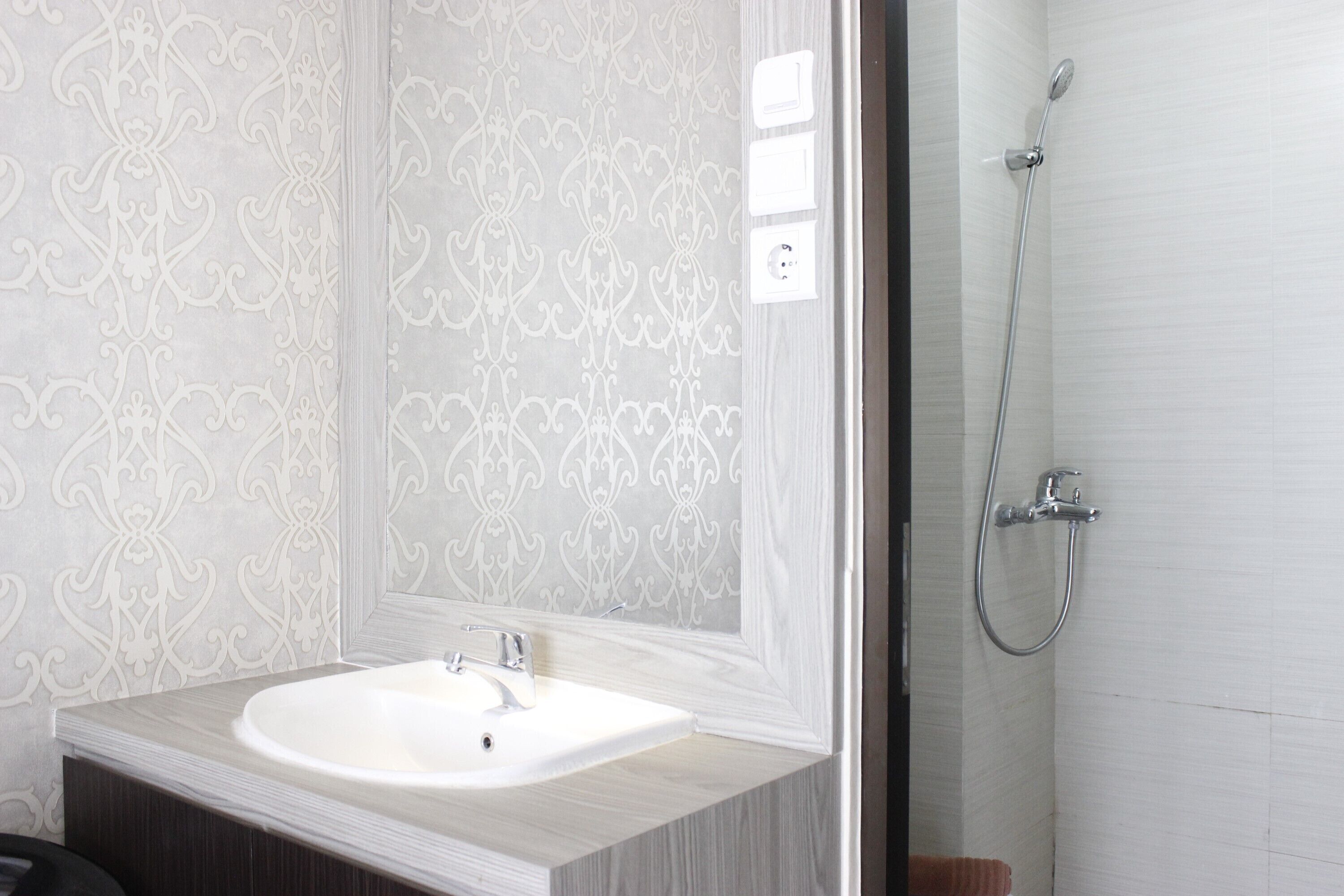 Habitación | Baño | Regadera y toallas 