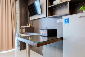 Quarto | Cozinha privada | Geladeira, cooktop, talheres/pratos/utensílios de cozinha