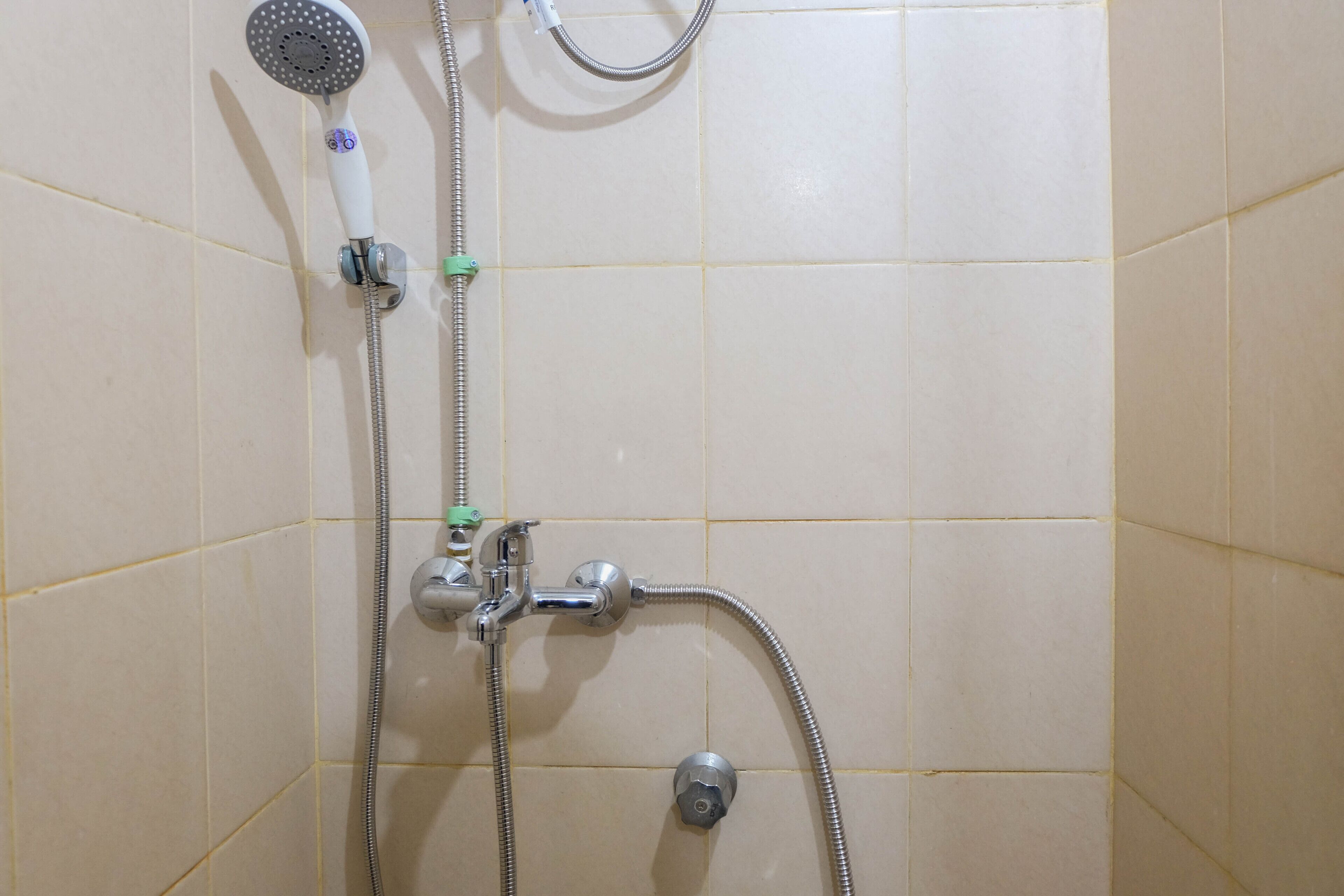 Habitación | Baño | Regadera y toallas 