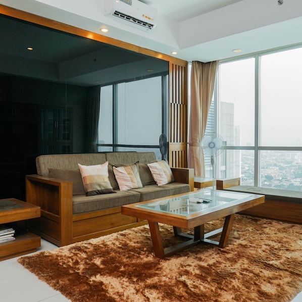 Room | Living area | TV - Suite 3BR Kemang Village Apartment (Jakarta)