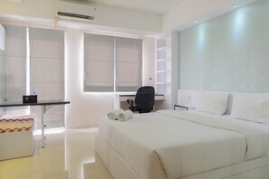 Room | Living area | Flat-screen TV - Strategic Studio Room Park View Condominium Apartment (Depok)
