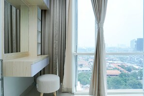 2 bedrooms, free WiFi, bed sheets - Cozy Minimalist 2BR with City View at Atlanta Apartment (Depok)