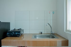 Room | Bathroom sink - Cozy Studio Apartment at Margonda Residence 4 (Depok)