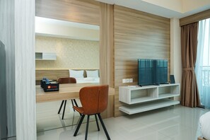 Room | Living area | TV - Cozy Studio Apartment at Nine Residence connected to Mall (Jakarta)