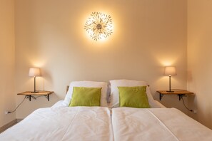 2 dormitorios, tabla de planchar con plancha, wifi y ropa de cama