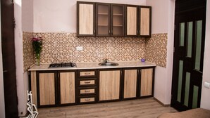 Chambre Confort avec lits jumeaux, cuisine