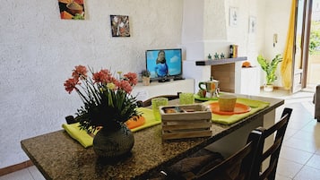 Traditional Apartment, 1 Bedroom, Balcony | Living area | 32-inch LCD TV with satellite channels, TV