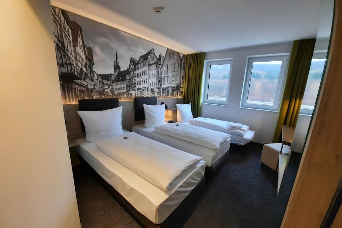 standard triple room | in-room safe, desk, laptop workspace, soundproofing