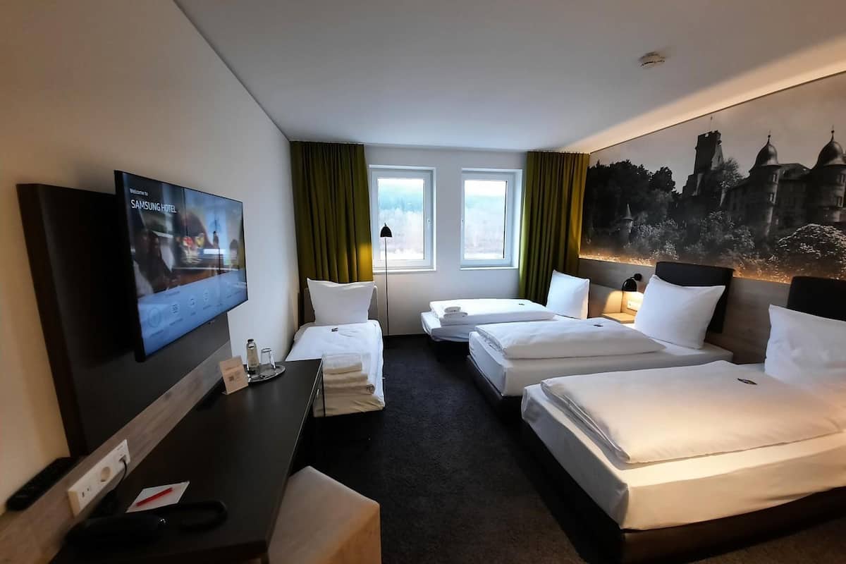 standard triple room | in-room safe, desk, laptop workspace, soundproofing