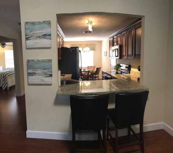 Microwave, dishwasher, coffee/tea maker, cookware/dishes/utensils