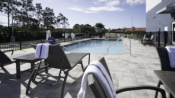 Outdoor pool, open 7:00 AM to 10:00 PM, sun loungers