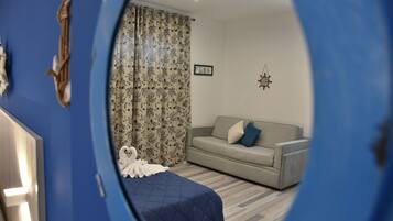 Triple Room, Private Bathroom | In-room safe, desk, free WiFi