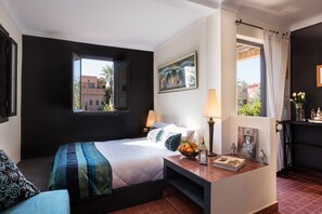 Double or Twin Room | Minibar, in-room safe, individually decorated, individually furnished