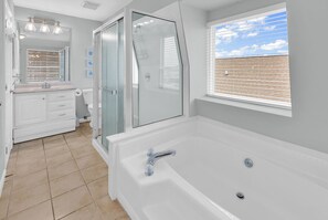 Shower, jetted tub, towels