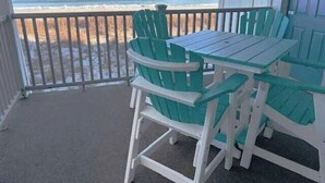 A balcony with a view of the beach and ocean. - Sand Dollar 101 - Oceanfront in Garden City Beach (Garden City)