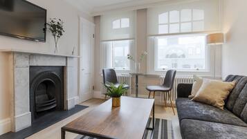 Flat-screen TV, fireplace