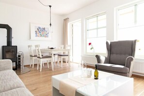 Ferienhaus (No. 15) | Wohnzimmer | Fernseher