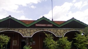 A building with a sign reading "Sundowner Lodge". - Sundowner Lodge (Nakuru)