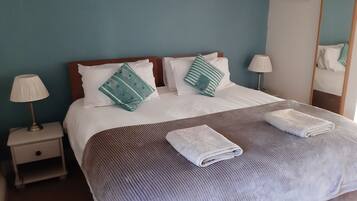 Deluxe Cottage (2 -4 Adults) | 1 bedroom, blackout drapes, iron/ironing board, free WiFi