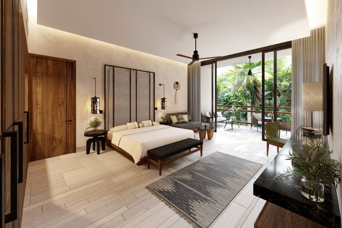 A modern bedroom with a large bed, a desk, and a balcony with plants.