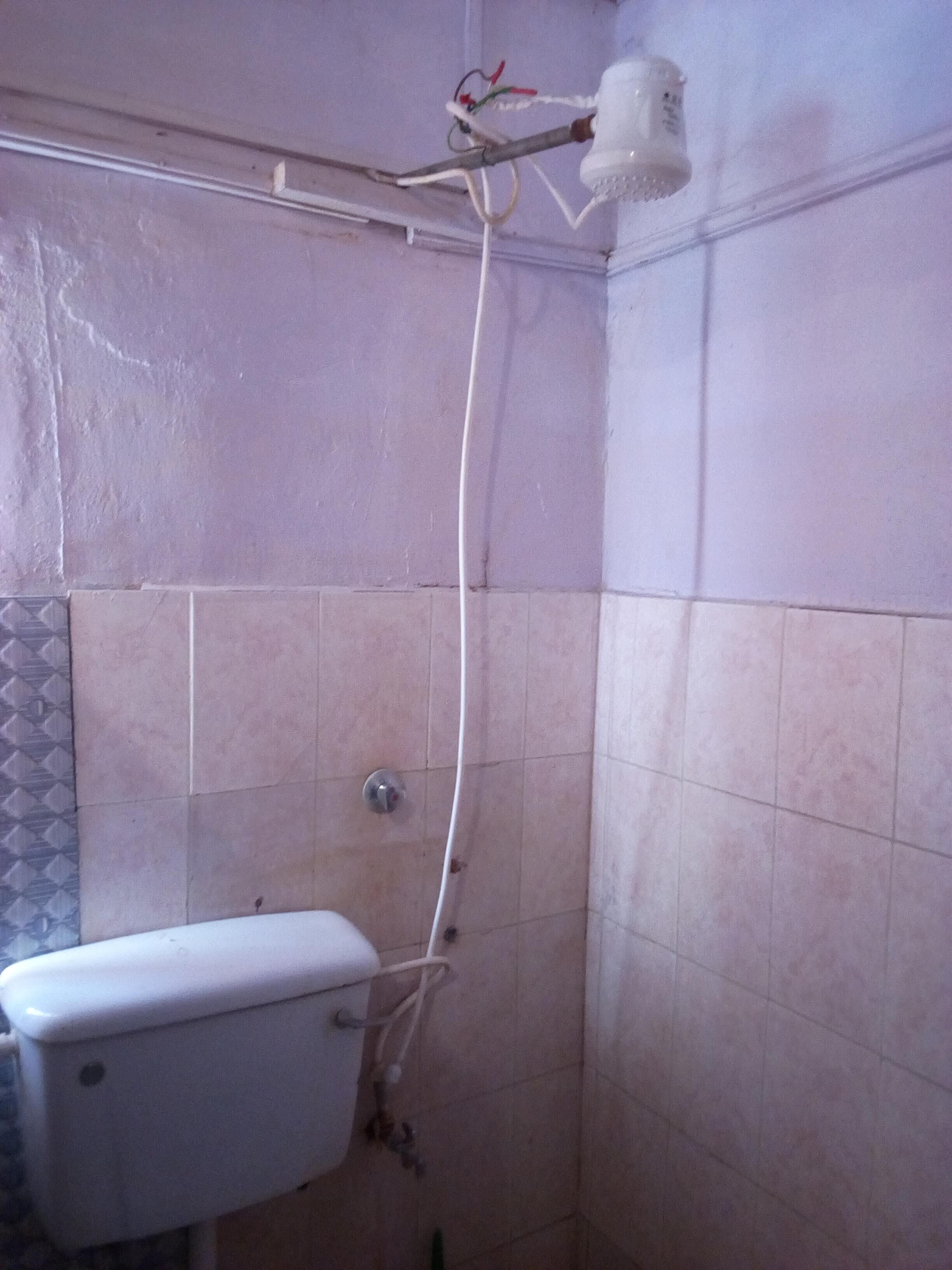 Shower, free toiletries, slippers, towels