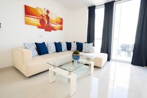 Apartment, 3 Bedrooms (1) | Living area | LED TV