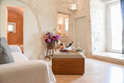 Villa de luxe "Trulli Terrarossa" dans le style des Pouilles avec piscine