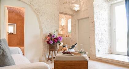 Villa de luxe "Trulli Terrarossa" dans le style des Pouilles avec piscine