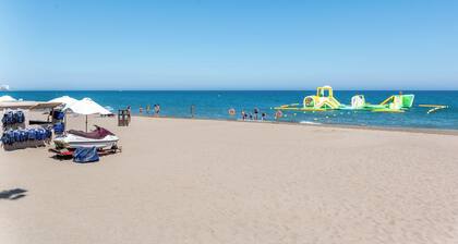 Charming Holiday Home Apartamento Boliches with Sea View, Wi-Fi & Terrace