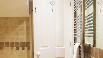 Combined shower/bathtub, hair dryer, towels, soap