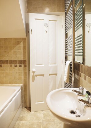 Combined shower/tub, hair dryer, towels, soap