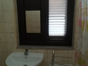 Hair dryer, soap, toilet paper - Sardinia, Eastern coast in the crystal clear waters of Posada (Posada)