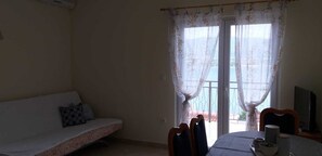 Chambre Classique | Salle de séjour | Télévision à écran plat