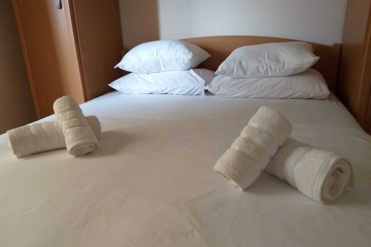 Apartemen Keluarga | 2 kamar tidur, Wi-Fi gratis, dan seprai linen