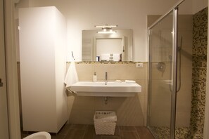 Apartment, 1 Bedroom | Bathroom | Shower, rainfall showerhead, hair dryer, bidet