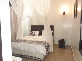 Double Room | Desk, blackout drapes, iron/ironing board, free WiFi