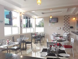 Breakfast, lunch, dinner served; local and international cuisine 