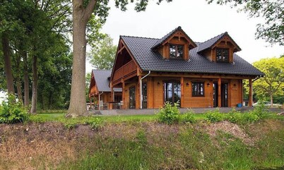 Luxury Wooden Villa Dirk in Forested Area with Stunning Countryside Views