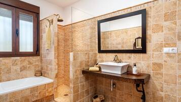 Bathtub, hair dryer, towels