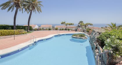 Holiday Home “Nerja Capistrano Villa” with Sea View, Wi-Fi, Garden, Terrace & Shared Pool