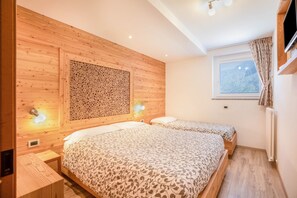 2 slaapkamers, een strijkplank/strijkijzer, gratis wifi, beddengoed