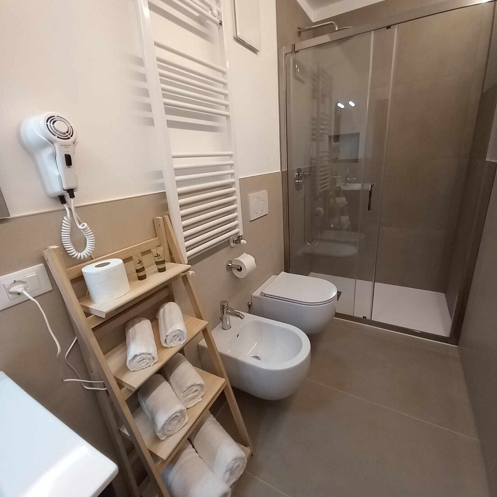 Bathtub, hair dryer, towels