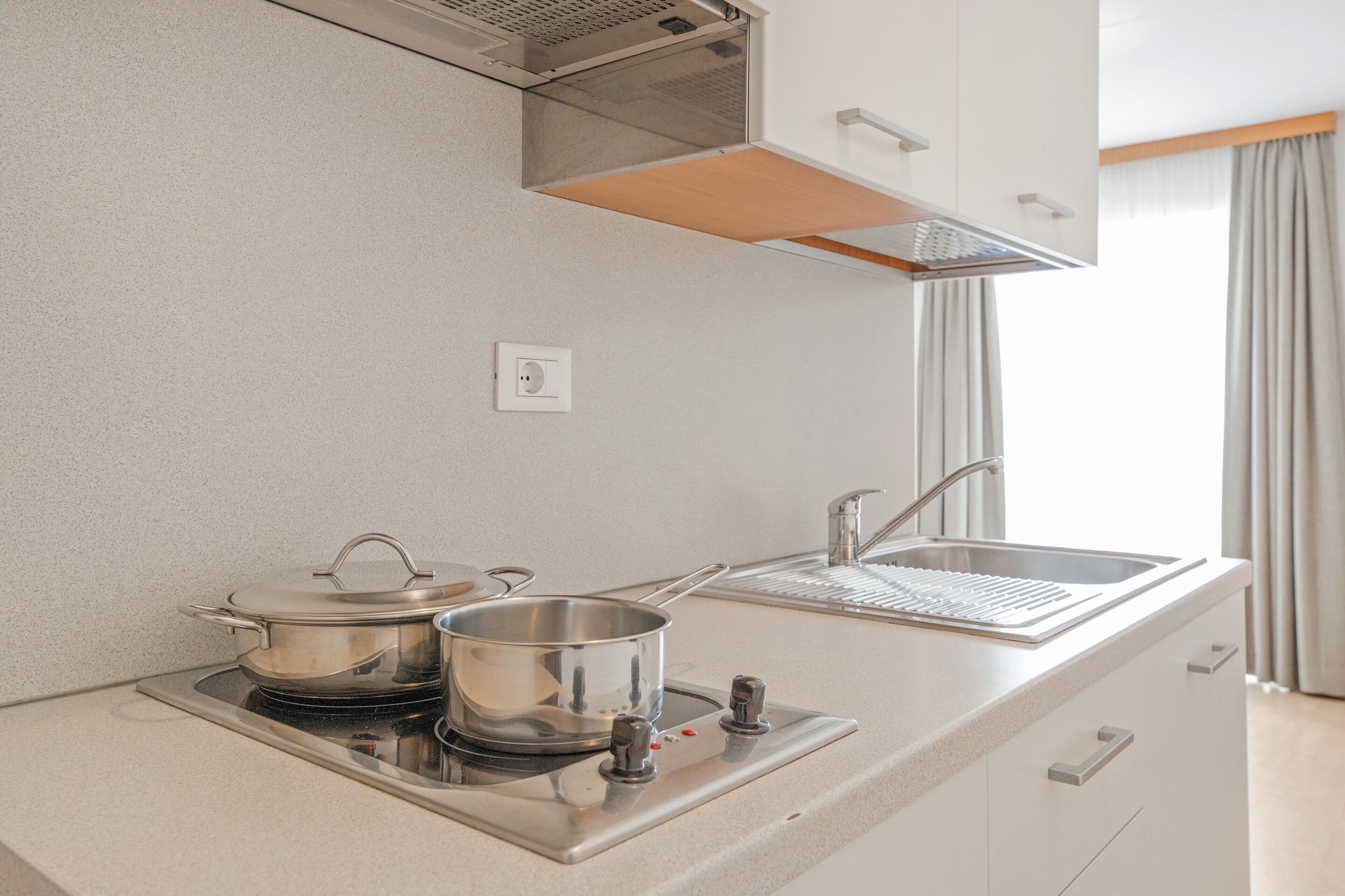 Fridge, stovetop, coffee/tea maker, electric kettle