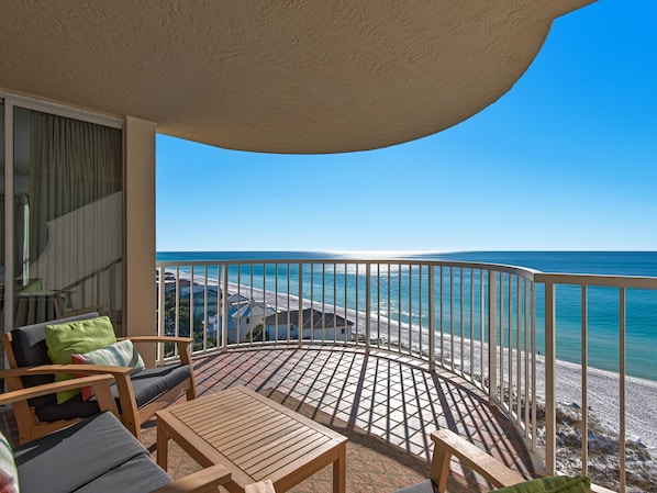 A balcony with a view of the beach and ocean. - Check-in Onsite, Free Beach Chair Service, Beach Views from your Balcony (Miramar Beach)