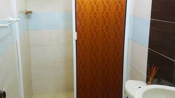 Shower, bidet, towels, soap