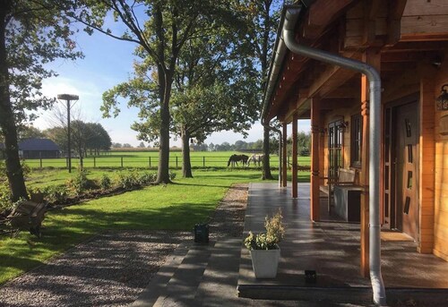 Luxury Wooden Villa Tine in Forested Area with Stunning Views of the Countryside